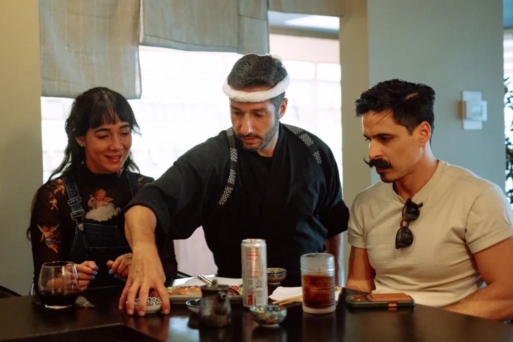 Sushi Dojo — Chef David with guests